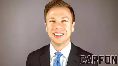 Spears Business assistant professor Dinkel wins research awards for legal ethics papers